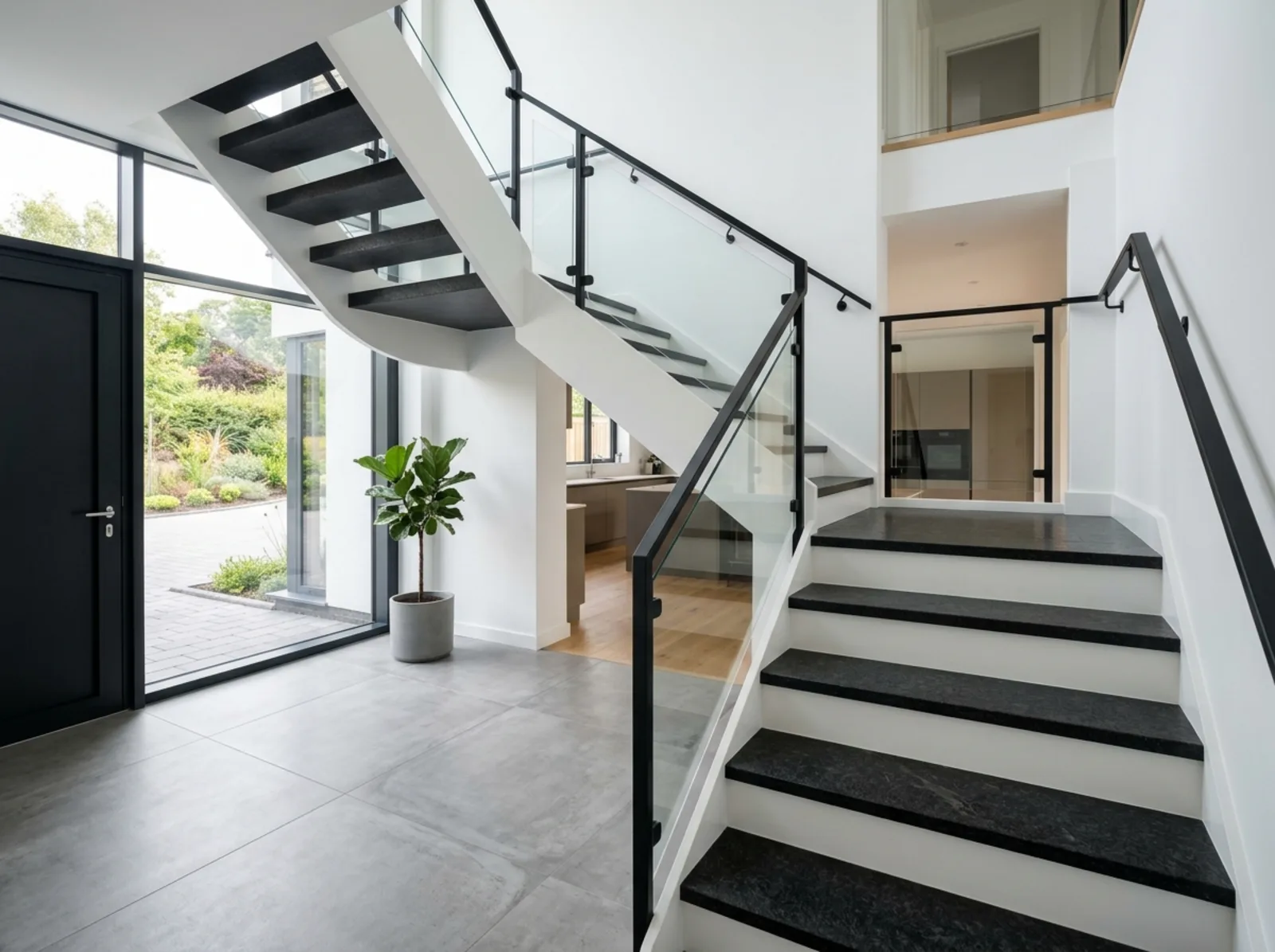 Granittreppe aus Nero Assoluto im Neubau – Referenz von Remzi & Neil Granit